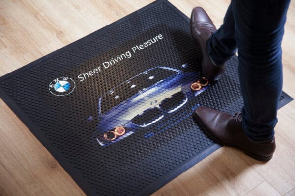 Tapis logo caoutchouc