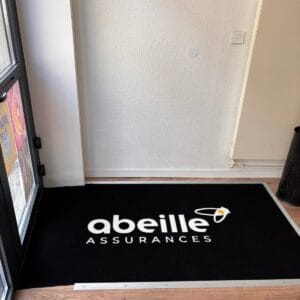 Tapis logo fibre synthétique
